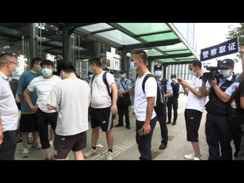Disgruntled Chinese investors protest outside Evergrande HQ for third day