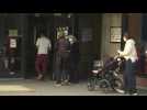 Canada's snap election: People wait in line in Montreal as polls open