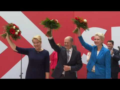 German SPD celebrates narrow win at general election