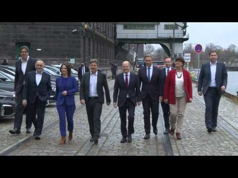 Family photo of German SPD, Greens and liberal FDP parties ahead of coalition deal announcement
