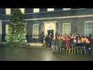 UK PM Johnson turns on Christmas lights outside 10 Downing Street