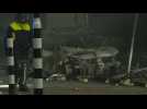 Dutch police inspect damage in aftermath of Covid riot