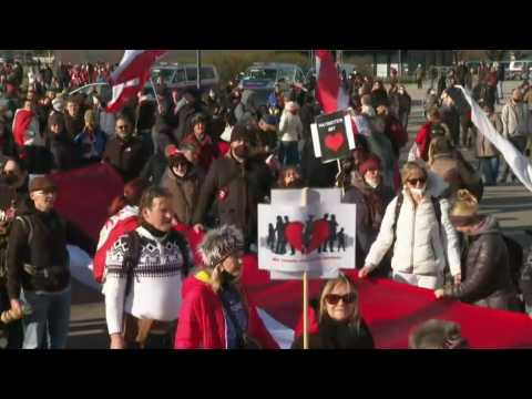 Demonstration in Vienna as partial lockdown announced and coronavirus vaccines become mandatory