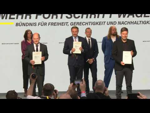 German party leaders sign the new coalition deal as Merkel era ends