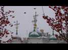 Images from Russia's capital as snowfall could break records