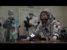 Japanese tycoon Maezawa checks spacesuit before tourist launch to ISS