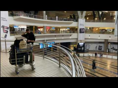 Passengers stuck at Johannesburg airport as new variant sparks travel bans