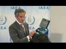 IAEA Director General shows the type of cameras used in Iranian facility