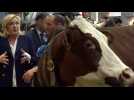 French poll hopeful Le Pen meets farmers at Paris agricultural fair