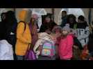 Ukrainians board Chisinau-bound bus at Ukraine-Moldova border