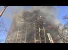 Ukraine firefighters battle flames on Kyiv high-rise