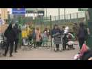 Refugees cross border from Ukraine into Poland