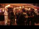 Israeli police and people gather at the scene of Tel Aviv attack