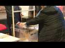 Voting starts in the French capital as Macron seeks new term