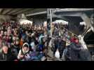 Ukrainians evacuate city near Kyiv by foot