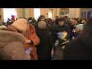 Ukrainian refugees sleep at Przemysl train station