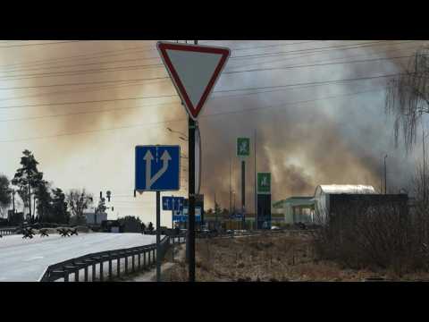 Smoke billows after Russian shelling north of Kyiv