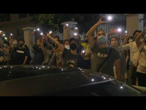 Crowds gather outside Hong Kong paper Apple Daily's headquarters to show support