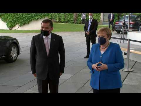 Angela Merkel greets Libyan Prime Minister Abdulhamid Dbeibah