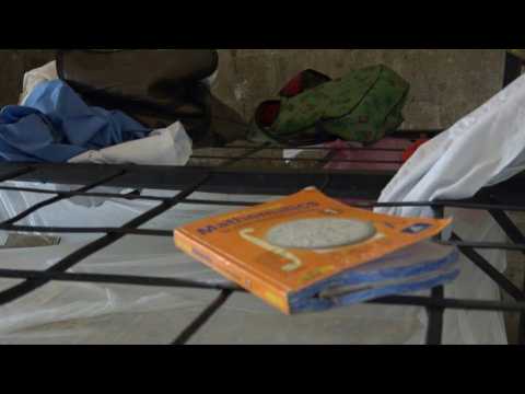 Parents gather at Nigeria school after gunmen kidnap 140 students
