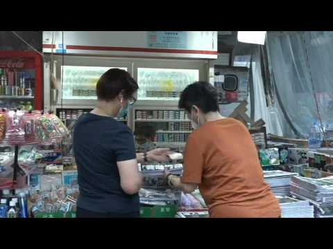 Hong Kongers buy copies of pro-democracy paper Apple Daily's last edition