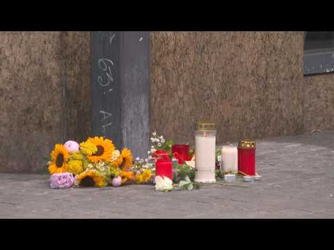 Flowers, candles at scene of deadly knife attack in Germany