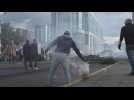 Ecuador police, protesters clash outside congress