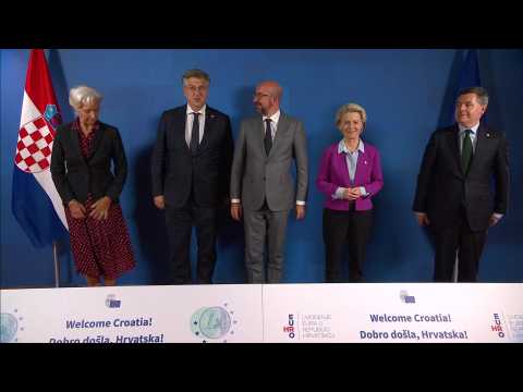 Croatian PM poses in group photo with ECB chief and EU chief as Croatia joins the Euro