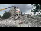 Rescuers search through the rubble after a strike in eastern Ukrainian town of Chasiv Yar