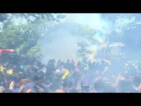 Police fire tear gas as thousands mob Sri Lanka PM's office
