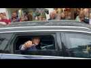 Macron and wife Brigitte leave home to vote in French elections