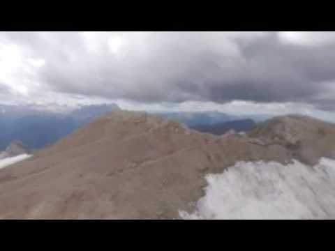 Images of the Marmolada glacier from a helicopter, as rescue operations continue