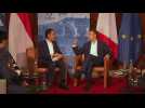 French President Emmanuel Macron meets Indonesian President Joko Widodo during G7 summit in Germany