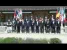 G7 leaders and guests pose for family photo