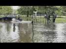 Images of flooded road in Brooklyn, New York, after heavy rains