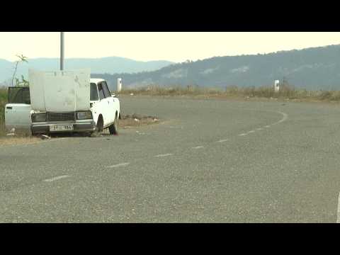 Images show abandoned cars on Lachin Corridor