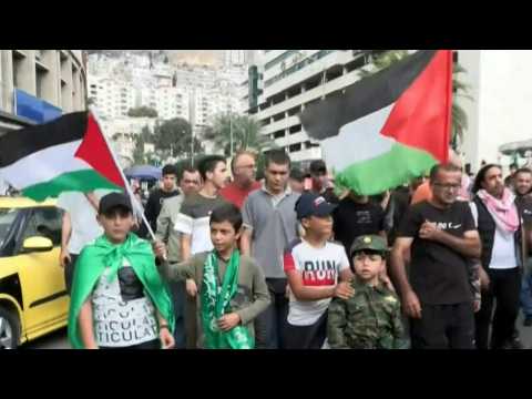 Hundreds of protesters gather in downtown Nablus in support with Gaza