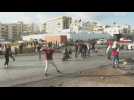 Palestinians throw stones at Israeli forces in West Bank