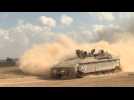 Convoy of Israeli armoured personnel carriers drive near Gaza border
