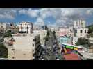 Palestinians throw stones at Israeli forces following rally in Hebron