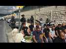 Palestinians make Friday Noon prayers in the street