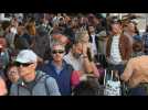 People wait at Haifa port as US evacuates citizens from Israel to Cyprus