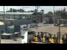 UN vehicles wait on Palestinian side of Rafah border for trucks from Egypt to cross