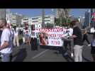 Families of hostages taken by Hamas protest in Israel's Tel Aviv