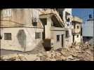 Damaged houses and cars in West Bank after deadly Israeli raid