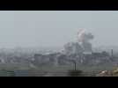 Smoke rises after a blasts in northern Gaza