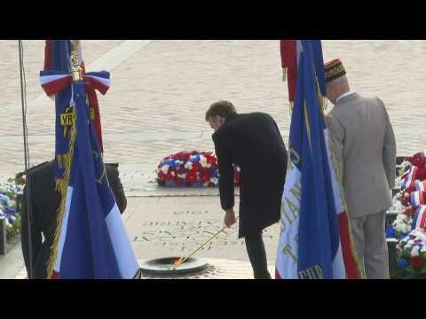 1918 Armistice: Macron rekindles flame at Tomb of the Unknown Solider