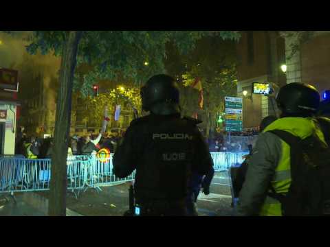 Far-right protesters against Catalan amnesty deal throw flares at police