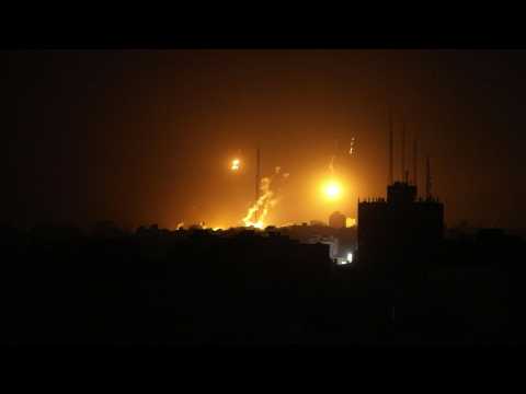 Flares flares light up sky at night in Gaza City