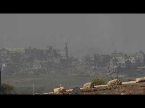 Israeli soldiers patrol the ruins in the northern Gaza Strip